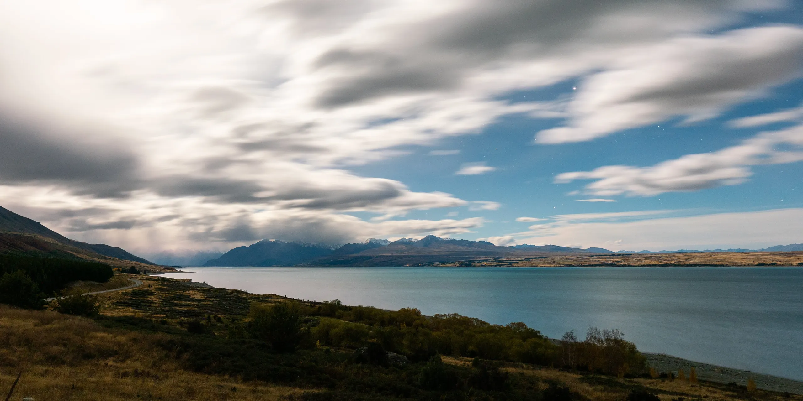 We stopped shortly before Aoraki to take some photos across Lake Pukaki. The weather forecast was ominous; sure enough, we arrived at the campsite around 10pm to pouring rain.